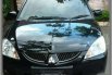 Mitsubishi lancer glxi evo 6 th 2005