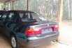 Mazda 323 1995 terbaik 4