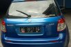 Mobil Suzuki SX4 2010 X-Over dijual, Jawa Timur 2