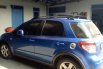 Mobil Suzuki SX4 2010 X-Over dijual, Jawa Timur 1