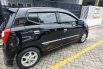 Mobil Daihatsu Ayla 2015 X Elegant dijual, Jawa Timur 1