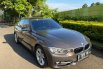 Jual Mobil BMW 3 Series 320i 2013 Terawat di Bekasi 8