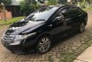 Mobil Honda City 2013 E dijual, Jawa Timur 1