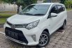 PROMO BOOKING Toyota Calya tahun 2018 putih 082310471910 1