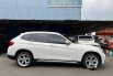 Mobil BMW X1 2014 sDrive18i xLine terbaik di DKI Jakarta 11