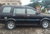 Isuzu Panther GRAND TOURING 2005 hitam cilla 1
