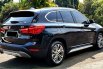 27rb mls BMW X1 sDrive 1.8i XLine AT 2018 hitam sunroof cash kredit proses bisa dibantu 5