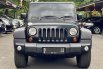 Jeep Wrangler Sport Unlimited 2011 Hitam 1