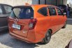 Daihatsu Sigra 1.2 X AT 2023 Orange 5