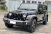 Jeep Wrangler Sport Unlimited 2011 Hitam 1