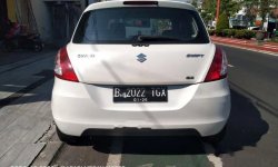 Mobil Suzuki Swift 2014 GX dijual, Jawa Timur 2