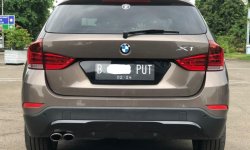BMW X1 SDRIVE 2.0 AT COKLAT 2013 MOBIL BEKAS BERKUALITAS!! 4