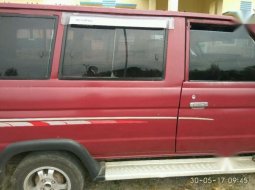 mobil kijang komando tahun 1990