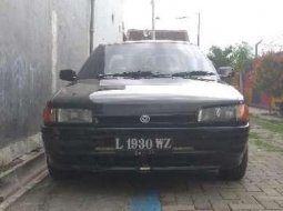 Mazda 323 1993 terbaik 8