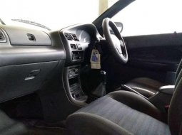 Mazda 323 1995 terbaik 6