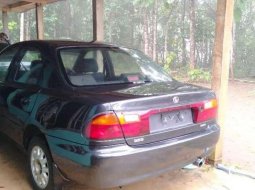 Mazda 323 1995 terbaik 4