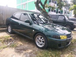 Mobil Mitsubishi Lancer 1999 SEi terbaik di Sumatra Barat 1