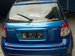 Mobil Suzuki SX4 2010 X-Over dijual, Jawa Timur 2