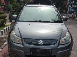 Jual Cepat Mobil Suzuki SX4 X-Over 2009 Abu-abu di Jawa Timur 2