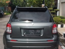 Jual Cepat Mobil Suzuki SX4 X-Over 2009 Abu-abu di Jawa Timur 4