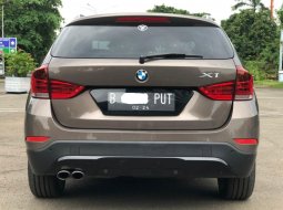 DISKON BMW X1 SDRIVE DIESEL AT COKLAT 2013 4