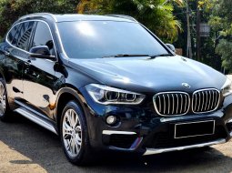 27rb mls BMW X1 sDrive 1.8i XLine AT 2018 hitam sunroof cash kredit proses bisa dibantu 1