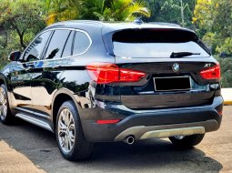 27rb mls BMW X1 sDrive 1.8i XLine AT 2018 hitam sunroof cash kredit proses bisa dibantu 10
