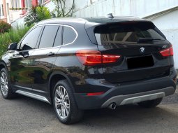 BMW X1 sDrive18i xLine 2018 odo 27rb mls sunroof hitam cash kredit proses bisa dibantu 7