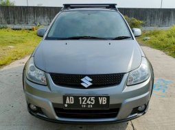 Suzuki SX4 X-Over 2010 tangan pertama