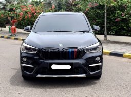 BMW X1 sDrive18i xLine 2018 hitam sunroof 32ribuan mls cash kredit proses bisa dibantu