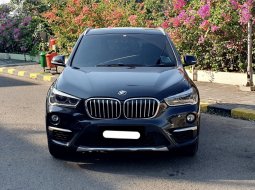 BMW X1 sDrive18i xLine 2018 hitam sunroof km27ribuan cash kredit proses bisa dibantu
