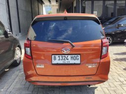 Daihatsu Sigra 1.2 X AT 2023 Orange 6