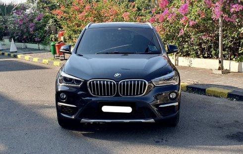 BMW X1 sDrive18i xLine 2018 hitam sunroof km27ribuan cash kredit proses bisa dibantu