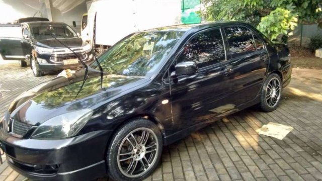 Promo mobil baru bekas Mitsubishi Lancer 2010 . Dapatkan 