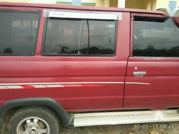 mobil kijang komando tahun 1990