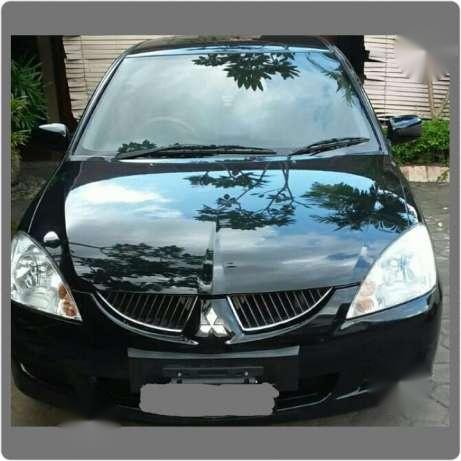 Mitsubishi lancer glxi evo 6 th 2005