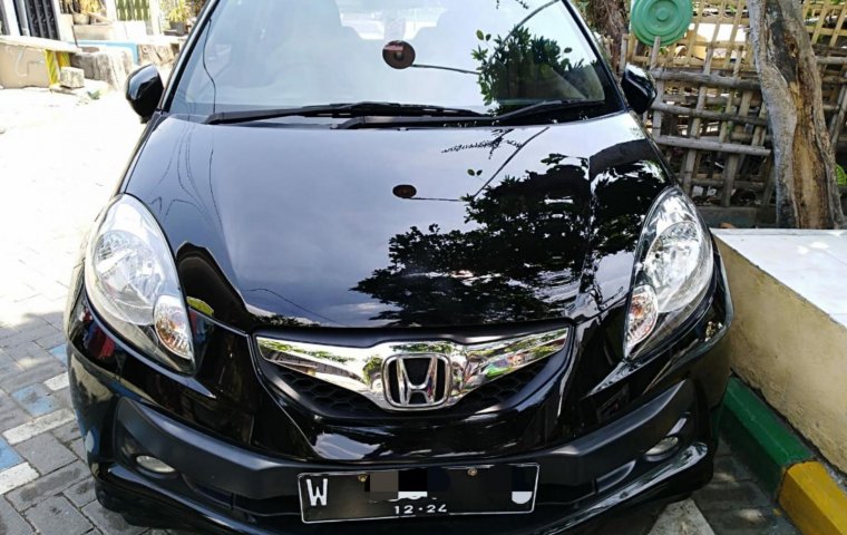 Jual cepat mobil bekas Honda Brio E 2014 terawat di Jawa Timur