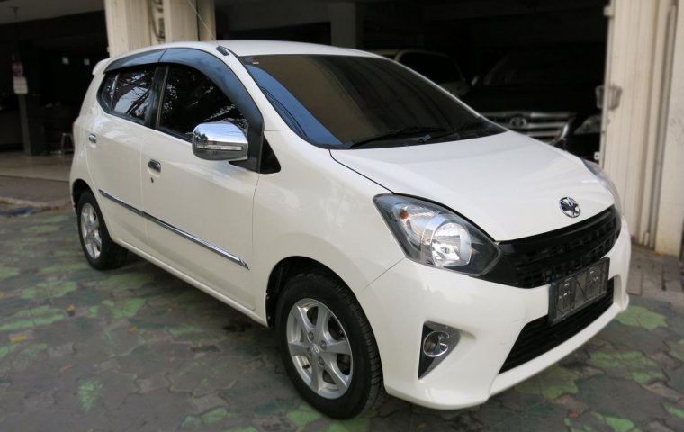 Jual mobil bekas Toyota Agya G Automatic 2014 dengan harga murah di Jawa timur