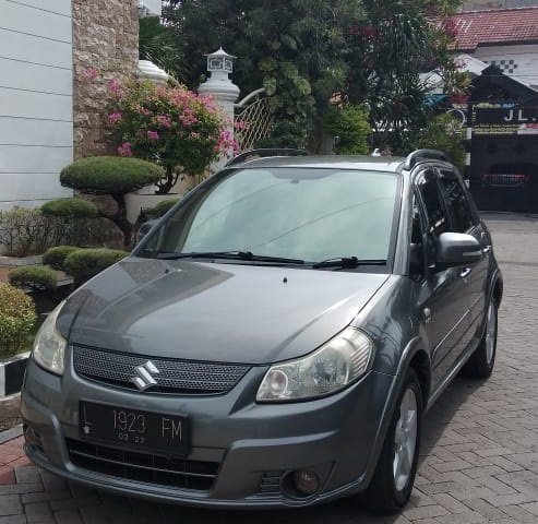 Jual Cepat Mobil Suzuki SX4 X-Over 2009 Abu-abu di Jawa Timur