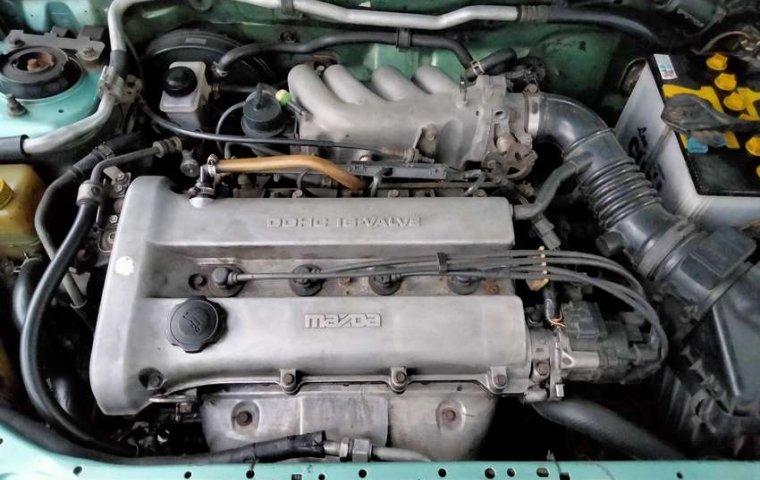 Mobil Mazda Familia 1997 terbaik di Jawa Timur